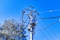 View below of Transformers small sphere size and electric wire phone lines. Energy and technology. Royalty Free Stock Photo