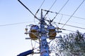 View from below of Transformers small sphere size and electric wire phone lines. Energy and technology Royalty Free Stock Photo