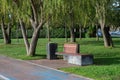 Park Bench and Trash Bin Royalty Free Stock Photo