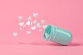 Open pastel blue medical pill with many hearts falling out. Royalty Free Stock Photo