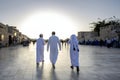 Happy Arabic kids wearing traditional Arabian gulf clothes in wakra Souq Doha Qatar.