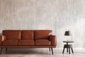 Living room. Living room with leather armchair on empty wall background. Royalty Free Stock Photo