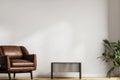 Living room. Living room with leather armchair on empty wall background. Royalty Free Stock Photo