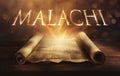 Glowing open scroll parchment revealing the book of the Bible. Book of Malachi Royalty Free Stock Photo