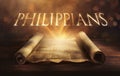 Glowing open scroll parchment revealing the book of the Bible. Book of Philippians Royalty Free Stock Photo