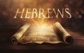 Glowing open scroll parchment revealing the book of the Bible. Book of Hebrews Royalty Free Stock Photo