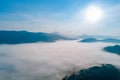 Fog. Surreal beautiful forest with fog. Aerial view. Beautiful sunrise above the forest with heavy fog Royalty Free Stock Photo