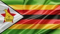Close up shot of wavy flag of Zimbabwe Royalty Free Stock Photo