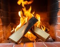 Close-up of burning firewood in a fireplace at home. Royalty Free Stock Photo