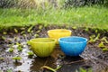 in rainy weather containers wait for rain to collect water. Royalty Free Stock Photo