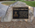 Bronze Welcome to Gantt Plaza plaque mounted on stone at the entrance to Gantt Plaza in Asheville, North Carolina.