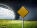 Blank yellow street sign isolated on a field during tornado season Royalty Free Stock Photo