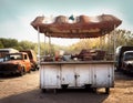 old and the best sausage stand next to a junkyard Royalty Free Stock Photo