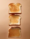 Flying toast bread isolated on brown background. Toast bread flying in the air Royalty Free Stock Photo