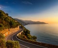 Ligurian road that runs along the sea at dawn Royalty Free Stock Photo