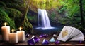 Deep green forest waterfall with a table in the foreground with gold tarot cards, lit candles, and amethyst crystals Royalty Free Stock Photo