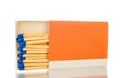 Wooden matches for lighting a fire in a paper box, macro. Royalty Free Stock Photo