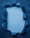 a piece of blue jeans material torn in the middle for text Royalty Free Stock Photo