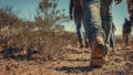 Group of people walking in the desert. Generative AI Royalty Free Stock Photo