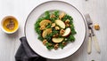 Kale apple walnut salad on a white dinner plate vinaigrette Royalty Free Stock Photo