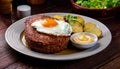 LeberkÃ¤se slices with fried egg and potato salad Royalty Free Stock Photo