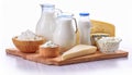 Milk dairy product composition. Group of dairy milk products ingredients on wood board isolated Royalty Free Stock Photo