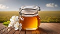 Honey in a glass jar with white flowers on floor board Royalty Free Stock Photo