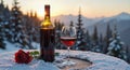 Bottle of Red wine and Pinot Noir drinking glass with a red rose on a wooden table Royalty Free Stock Photo