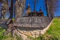 Fence and wooden Orthodox church in Andrzejowka. Royalty Free Stock Photo