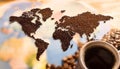 Coffee Beans World Drink. Coffee with beans and a world map Royalty Free Stock Photo