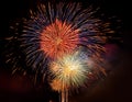 Fireworks Grand Finale. Beautiful fireworks going off with plenty of room for your text in the dark night sky Royalty Free Stock Photo