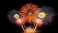 Fireworks Grand Finale. Beautiful fireworks going off with plenty of room for your text in the dark night sky Royalty Free Stock Photo