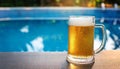 Beer-shot. A beer at the pool. Royalty Free Stock Photo