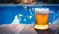 Beer-shot. A beer at the pool. Royalty Free Stock Photo