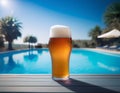 Beer-shot. A beer at the pool. Royalty Free Stock Photo