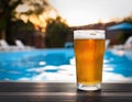 Beer-shot. A beer at the pool. Royalty Free Stock Photo
