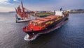 Container ship in port terminal - huge freighter fully loaded Royalty Free Stock Photo