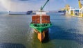 Container ship in port terminal - huge freighter fully loaded Royalty Free Stock Photo