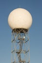 A Doppler radar tower against the blue sky Royalty Free Stock Photo