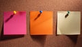 Colorful note papers. Post it notes on cork board Royalty Free Stock Photo