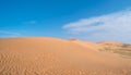 Desert concept, sand dune and blue sky Royalty Free Stock Photo