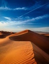 Desert concept, sand dune and blue sky Royalty Free Stock Photo