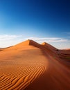 Desert concept, sand dune and blue sky Royalty Free Stock Photo