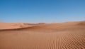 Desert concept, sand dune and blue sky Royalty Free Stock Photo