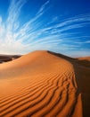 Desert concept, sand dune and blue sky Royalty Free Stock Photo