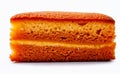 A slice of layered sponge cake with a golden-brown crust and light beige interior Royalty Free Stock Photo