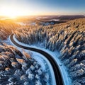 Road serpentine in wintertime from above. Asphalt road serpentine in snowy wintertime. Cold Royalty Free Stock Photo