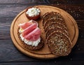 Crispy rye bread with sesame seeds, ham and cottage cheese. Royalty Free Stock Photo