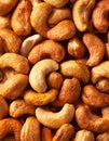 Roasted, salted cashew nuts close up. Full frame top view of huge amount of roasted, salted cashew nuts Royalty Free Stock Photo