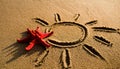 A sun with rays is drawn on the sand, and a sea red star was placed. Sun, rays, travel, starfish. Royalty Free Stock Photo